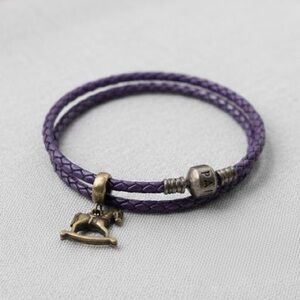 Pandora double leather bracelet with rocking horse charm